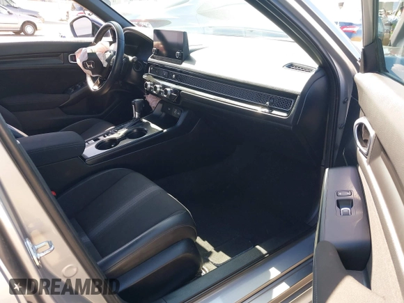 2023 Honda Civic Sport with VIN 2HGFE2F56PH500505, listed as a IAAI auction lot 42239112 with 39,513 mi miles and . Bid and sale history available at DreamBid. Image 5.
