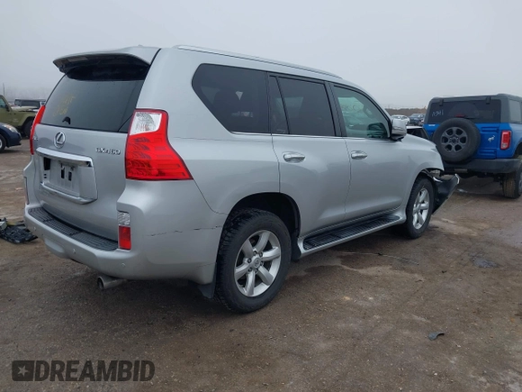 2010 Lexus GX 460 with VIN JTJBM7FX7A5014182, listed as a IAAI auction lot 41500959 with 183,832 mi miles and . Bid and sale history available at DreamBid. Image 4.