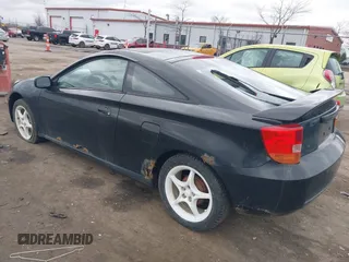 2000 Toyota Celica GT with VIN JTDDR32T7Y0006809, listed as a IAAI auction lot 41860933 with 262,014 mi miles. Bid and sale history available at carsss.com. Image 3.