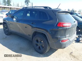 2015 Jeep Cherokee North with VIN 1C4PJMCS3FW777973, listed as a IAAI auction lot 42043203 with 158,536 mi miles. Bid and sale history available at carsss.com. Image 3.