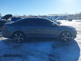 2015 Ford Taurus Limited with VIN 1FAHP2J85FG165823, listed as a IAAI auction lot 41315889 with 134,165 mi miles. Bid and sale history available at carsss.com. Image 13.