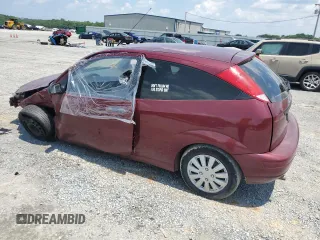 2007 Ford Focus S z VIN 1FAFP31N37W130031, wystawiony jako Copart lot #60123195 z przebiegiem 154 833 mil mil oraz Szkoda całkowita • Salvage title. Historia ofert i sprzedaży dostępna na DreamBid. Obrazek 2.
