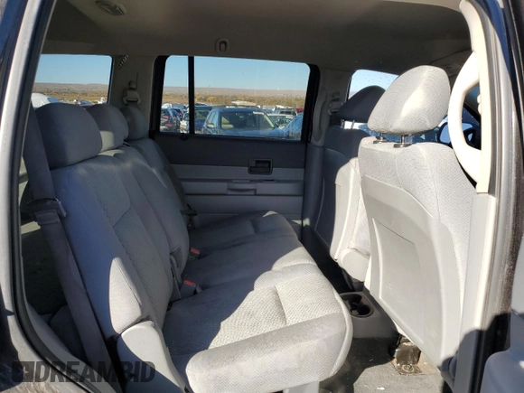 2009 Dodge Durango z VIN 1D8HD38K19F710373, wystawiony jako Copart lot #79876564 z przebiegiem Nie podano mil oraz Czysty tytuł • Clean title. Historia ofert i sprzedaży dostępna na DreamBid. Obrazek 10.