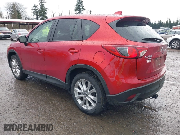 2015 Mazda CX-5 Grand Touring with VIN JM3KE4DY0F0479392, listed as a IAAI auction lot 41659415 with 141,403 mi miles. Bid and sale history available at carsss.com. Image 3.
