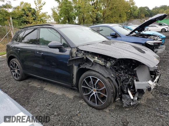 2022 Porsche Cayenne E-Hybrid with VIN WP1AE2AY8NDA26964, listed as a Copart auction lot 86710254 with 13,985 mi miles and Salvage title. Bid and sale history available at DreamBid. Image 4.