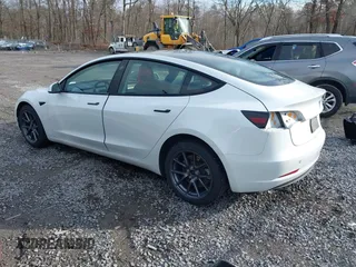 2023 Tesla Model 3 z VIN 5YJ3E1EAXPF543227, wystawiony jako IAAI lot #41150158 z przebiegiem 19 782 mil mil oraz . Historia ofert i sprzedaży dostępna na DreamBid. Obrazek 3.