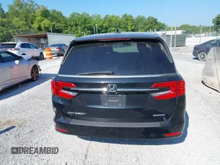 2021 Honda Odyssey Touring with VIN 5FNRL6H84MB027396, listed as a IAAI auction lot 42616650 with 67,207 mi miles and . Bid and sale history available at DreamBid. Image 16.
