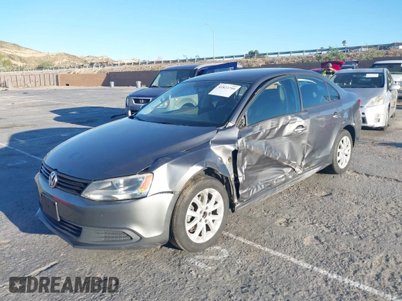 2012 Volkswagen Jetta Sedan SE w/Convenience with VIN 3VWDX7AJ7CM412976, listed as a IAAI auction lot 41823799 with 210,248 mi miles. Bid and sale history available at carsss.com. Image 2.