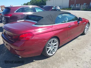 2012 BMW 6 Series 650i with VIN WBALZ3C5XCC397339, listed as a IAAI auction lot 39710830 with 59,467 mi miles. Bid and sale history available at carsss.com. Image 4.