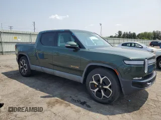 2022 Rivian R1T Adventure z VIN 7FCTGAAA5NN013983, wystawiony jako Copart lot #68013724 z przebiegiem 9006 mil mil oraz Szkody całkowita. Historia ofert i sprzedaży dostępna na DreamBid. Obrazek 4.