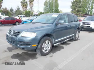 2005 Volkswagen Touareg 3.2L V6 with VIN WVGZG77L55D071024, listed as a IAAI auction lot 42111205 with 204,417 mi miles and . Bid and sale history available at DreamBid. Image 2.
