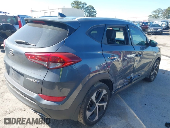 2016 Hyundai Tucson Limited with VIN KM8J33A26GU075023, listed as a IAAI auction lot 41656851 with 125,277 mi miles and . Bid and sale history available at DreamBid. Image 4.