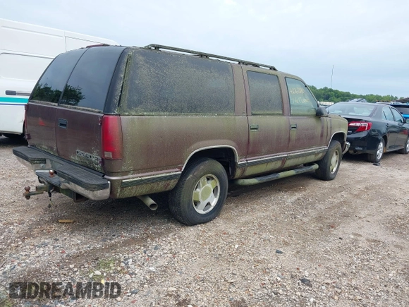 1996 Chevrolet Suburban z VIN 1GNFK16R8TJ397396, wystawiony jako IAAI lot #42367280 z przebiegiem 287 980 mil mil oraz . Historia ofert i sprzedaży dostępna na DreamBid. Obrazek 4.