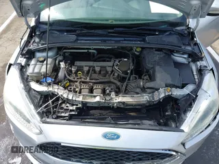 2015 Ford Focus SE with VIN 1FADP3F24FL203509, listed as a IAAI auction lot 41765582 with 139,856 mi miles. Bid and sale history available at carsss.com. Image 10.