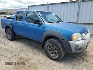 2001 Nissan Frontier SE with VIN 1N6ED27T91C390230, listed as a Copart auction lot 58844905 with 157,883 mi miles and Salvage title. Bid and sale history available at DreamBid. Image 4.