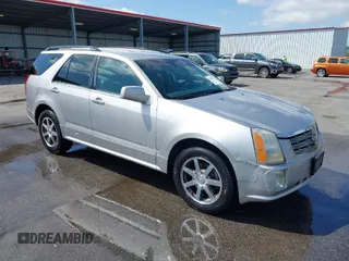 2004 Cadillac SRX with VIN 1GYDE63A740111607, listed as a IAAI auction lot 41918519 with 239,042 mi miles. Bid and sale history available at carsss.com. Image 1.
