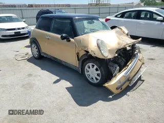 2004 MINI Hardtop z VIN WMWRC33454TC50742, wystawiony jako Copart lot #56655565 z przebiegiem Nie podano mil oraz Szkoda całkowita • Salvage title. Historia ofert i sprzedaży dostępna na DreamBid. Obrazek 14.