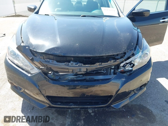 2018 Nissan Altima SV with VIN 1N4AL3AP5JC285843, listed as a IAAI auction lot 41956374 with 100,688 mi miles and . Bid and sale history available at carsss.com. Image 6.