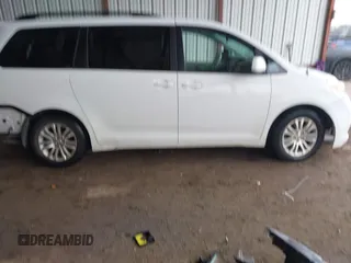 2014 Toyota Sienna XLE with VIN 5TDYK3DC6ES444121, listed as a IAAI auction lot 42110190 with 240,366 mi miles and . Bid and sale history available at DreamBid. Image 13.