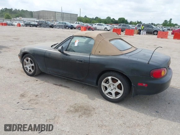 1999 Mazda MX-5 Miata with VIN JM1NB353XX0126008, listed as a IAAI auction lot 42435673 with 194,313 mi miles and . Bid and sale history available at DreamBid. Image 3.