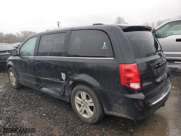 2012 Dodge Grand Caravan Crew with VIN 2C4RDGDG8CR350319, listed as a Copart auction lot 50009095 with 107,924 mi miles and Salvage Title. Bid and sale history available at carsss.com. Image 2.