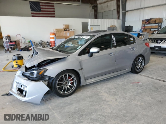 2016 Subaru WRX Premium z VIN JF1VA1E69G9828081, wystawiony jako Copart lot #63122085 z przebiegiem 52 984 mil mil oraz Szkoda całkowita • Salvage title. Historia ofert i sprzedaży dostępna na DreamBid. Obrazek 1.