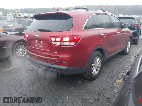 2017 Kia Sorento LX with VIN 5XYPG4A35HG215342, listed as a IAAI auction lot 40875287 with 118,146 mi miles. Bid and sale history available at carsss.com. Image 4.