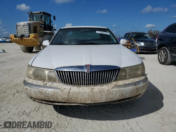 1998 Lincoln Continental with VIN 1LNFM97V5WY637895, listed as a Copart auction lot 77020154 with 0 mi miles and Salvage Title. Bid and sale history available at carsss.com. Image 5.