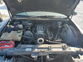 1996 Chevrolet Caprice with VIN 1G1BL82P2TR106404, listed as a Copart auction lot 74213214 with 156,588 mi miles and Salvage title. Bid and sale history available at DreamBid. Image 11.