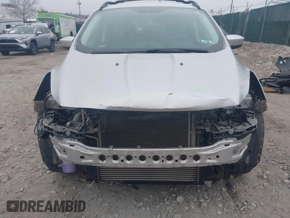 2016 Ford Escape SE with VIN 1FMCU9GX3GUB65337, listed as a IAAI auction lot 41767376 with 99,092 mi miles. Bid and sale history available at carsss.com. Image 6.