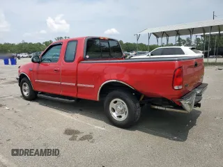 1997 Ford F-150 XL with VIN 1FTEX17L1VNB55769, listed as a Copart auction lot 58901715 with 174,234 mi miles and Salvage title. Bid and sale history available at DreamBid. Image 2.