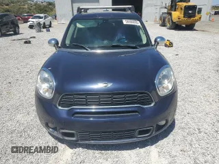 2013 MINI Countryman S ALL4 with VIN WMWZC5C50DWM15256, listed as a Copart auction lot 58080895 with 123,514 mi miles and Salvage title. Bid and sale history available at DreamBid. Image 5.