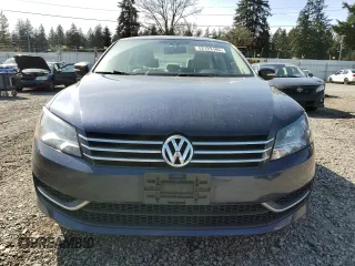 2014 Volkswagen Passat Wolfsburg Edition z VIN 1VWAT7A32EC036093, wystawiony jako Copart lot #52129185 z przebiegiem 106 949 mil mil oraz Szkoda całkowita • Salvage title. Historia ofert i sprzedaży dostępna na DreamBid. Obrazek 5.