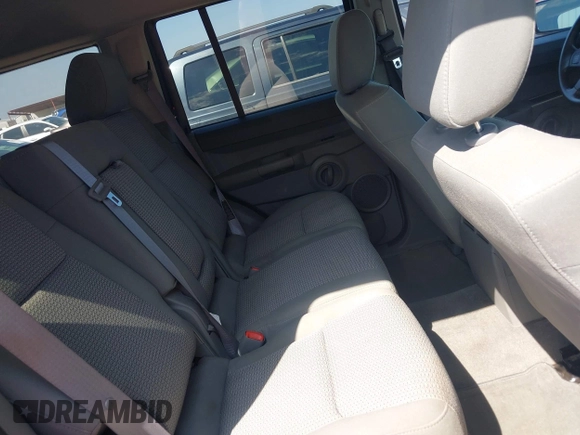 2007 Jeep Commander Sport z VIN 1J8HH48P97C619556, wystawiony jako IAAI lot #42343720 z przebiegiem 152 647 mil mil oraz . Historia ofert i sprzedaży dostępna na DreamBid. Obrazek 8.