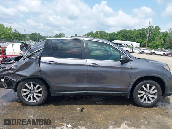 2019 Honda Pilot EX-L with VIN 5FNYF5H4XKB018306, listed as a IAAI auction lot 42441441 with 53,212 mi miles and . Bid and sale history available at DreamBid. Image 14.