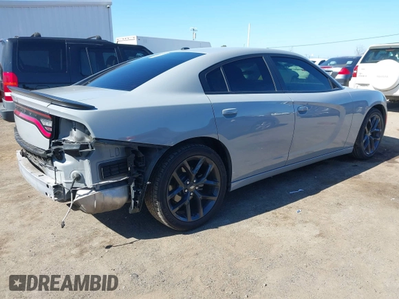 2022 Dodge Charger SXT with VIN 2C3CDXBG3NH231325, listed as a IAAI auction lot 41667810 with 74,967 mi miles and . Bid and sale history available at DreamBid. Image 4.