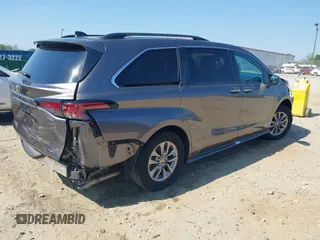 2021 Toyota Sienna XLE z VIN 5TDYRKEC0MS007394, wystawiony jako IAAI lot #42080004 z przebiegiem 75 553 mil mil oraz . Historia ofert i sprzedaży dostępna na DreamBid. Obrazek 4.