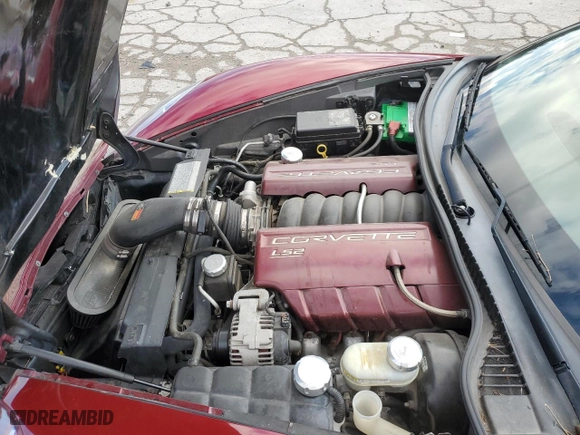 2006 Chevrolet Corvette with VIN 1G1YY26U365122082, listed as a Copart auction lot 82696614 with 125,425 mi miles and Salvage Title. Bid and sale history available at carsss.com. Image 12.