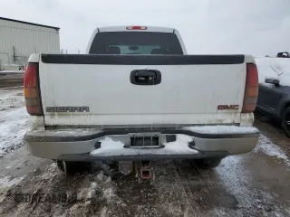 2003 GMC Sierra 1500HD SLE z VIN 1GTGK13UX3F218073, wystawiony jako Copart lot #73334613 z przebiegiem 222 753 mil mil oraz Szkody całkowita. Historia ofert i sprzedaży dostępna na DreamBid. Obrazek 6.