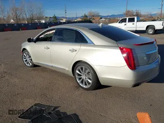 2014 Cadillac XTS Luxury z VIN 2G61N5S3XE9298471, wystawiony jako IAAI lot #41069292 z przebiegiem 92 112 mil mil oraz . Historia ofert i sprzedaży dostępna na DreamBid. Obrazek 3.