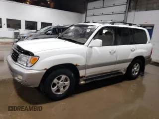 2000 Toyota Land Cruiser z VIN JT3HT05J6Y0120428, wystawiony jako Copart lot #61404845 z przebiegiem 225 559 mil mil oraz Czysty tytuł • Clean title. Historia ofert i sprzedaży dostępna na DreamBid. Obrazek 1.