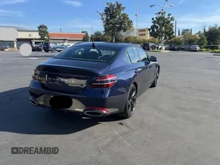 2023 Genesis G70 3.3T with VIN KMTG54TE6PU106021, listed as a Copart auction lot 86750284 with 8,669 mi miles and Salvage Title. Bid and sale history available at DreamBid. Image 4.