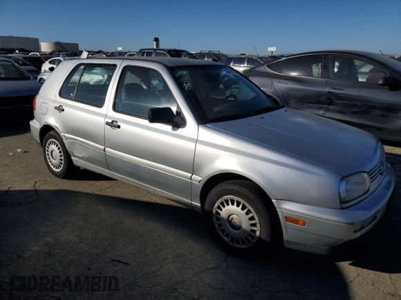 1998 Volkswagen Golf z VIN 3VWFA81H8WM251233, wystawiony jako Copart lot #42441795 z przebiegiem 122 969 mil mil oraz Czysty tytuł • Clean title. Historia ofert i sprzedaży dostępna na DreamBid. Obrazek 4.