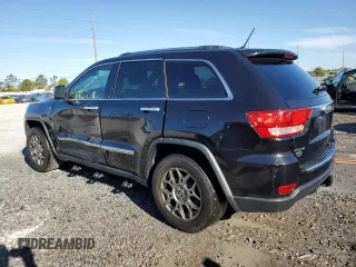 2013 Jeep Grand Cherokee Overland with VIN 1C4RJFCG2DC653207, listed as a Copart auction lot 48680885 with 276,020 mi miles and Salvage Title. Bid and sale history available at carsss.com. Image 2.