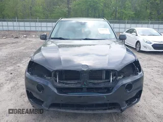 2016 BMW X5 xDrive35i z VIN 5UXKR0C55G0P26466, wystawiony jako IAAI lot #42005793 z przebiegiem 200 889 mil mil oraz . Historia ofert i sprzedaży dostępna na DreamBid. Obrazek 12.