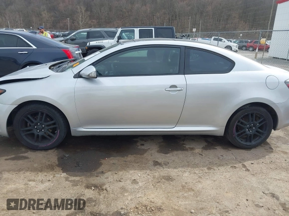 2010 Scion tC with VIN JTKDE3B75A0308354, listed as a IAAI auction lot 41811355 with 152,369 mi miles. Bid and sale history available at carsss.com. Image 14.