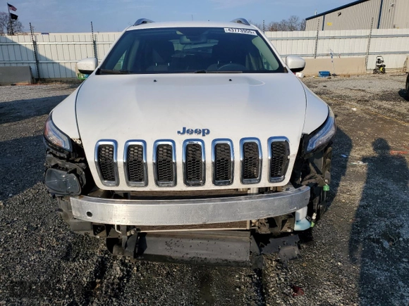 2016 Jeep Cherokee Altitude with VIN 1C4PJLCS4GW337000, listed as a Copart auction lot 43773955 with 134,996 mi miles and Salvage Title. Bid and sale history available at carsss.com. Image 5.