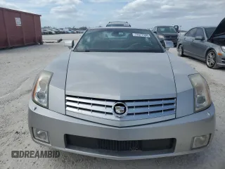 2004 Cadillac XLR z VIN 1G6YV34A945601007, wystawiony jako Copart lot #77077394 z przebiegiem Nie podano mil oraz Szkody całkowita. Historia ofert i sprzedaży dostępna na DreamBid. Obrazek 5.