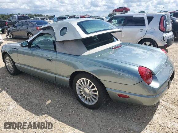 2004 Ford Thunderbird Pacific Coast Roadster with VIN 1FAHP63A04Y108766, listed as a Copart auction lot 74766964 with 30,107 mi miles and Salvage Title. Bid and sale history available at DreamBid. Image 2.