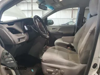 2016 Toyota Sienna LE AAS with VIN 5TDKK3DC6GS764404, listed as a Copart auction lot 63380615 with 123,221 mi miles and Salvage title. Bid and sale history available at DreamBid. Image 7.